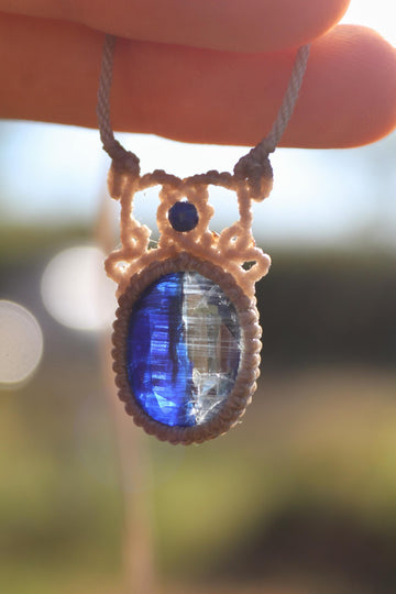 Kyanite pendant with faceted neon blue and clear kyanite