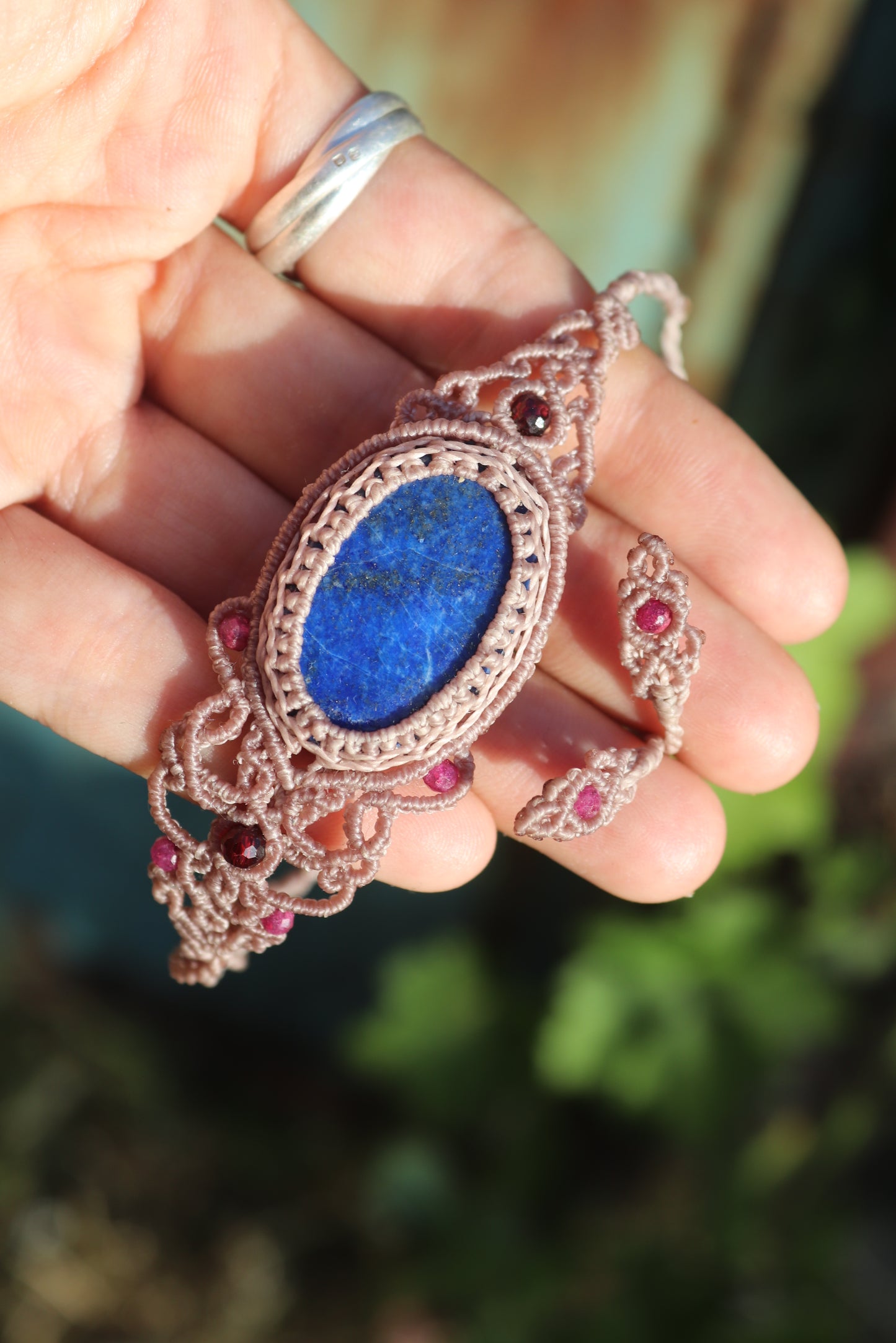 Lapis lazuli bracelet, asymmetrical design with garnet and ruby beads