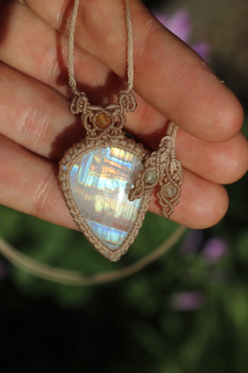 Translucent rainbow moonstone pendant with carnelian beads