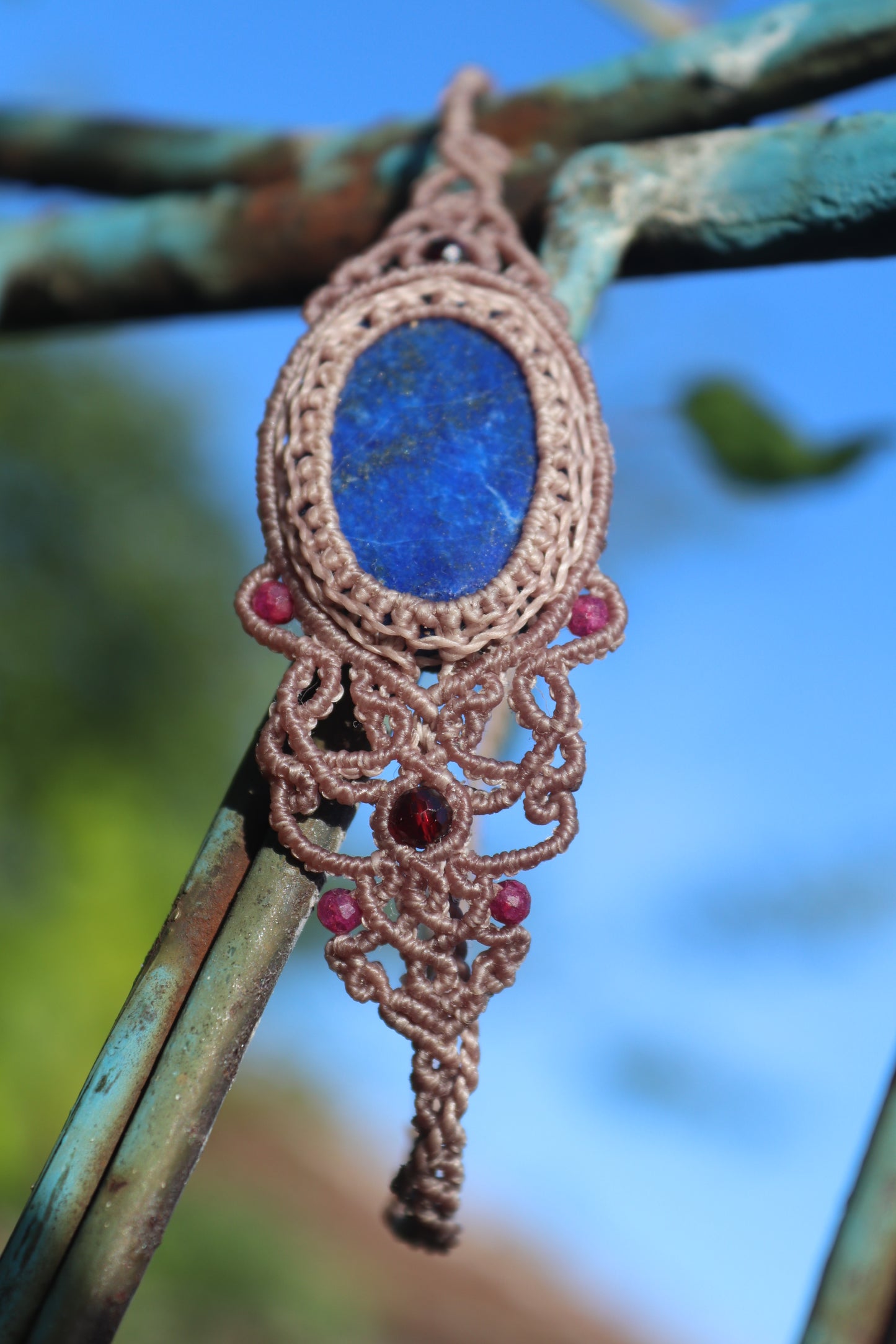 Lapis lazuli bracelet, asymmetrical design with garnet and ruby beads