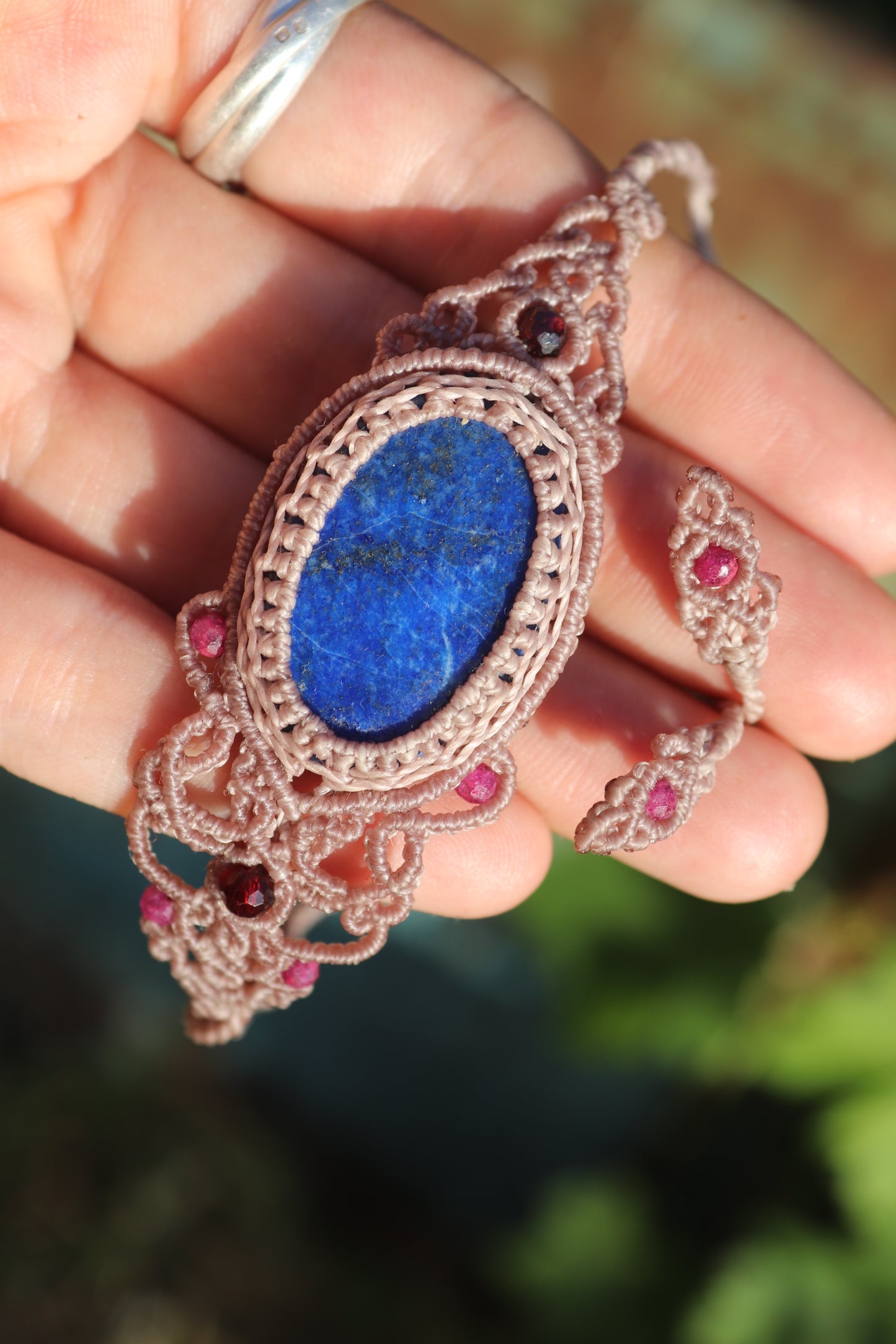 Lapis lazuli bracelet, asymmetrical design with garnet and ruby beads